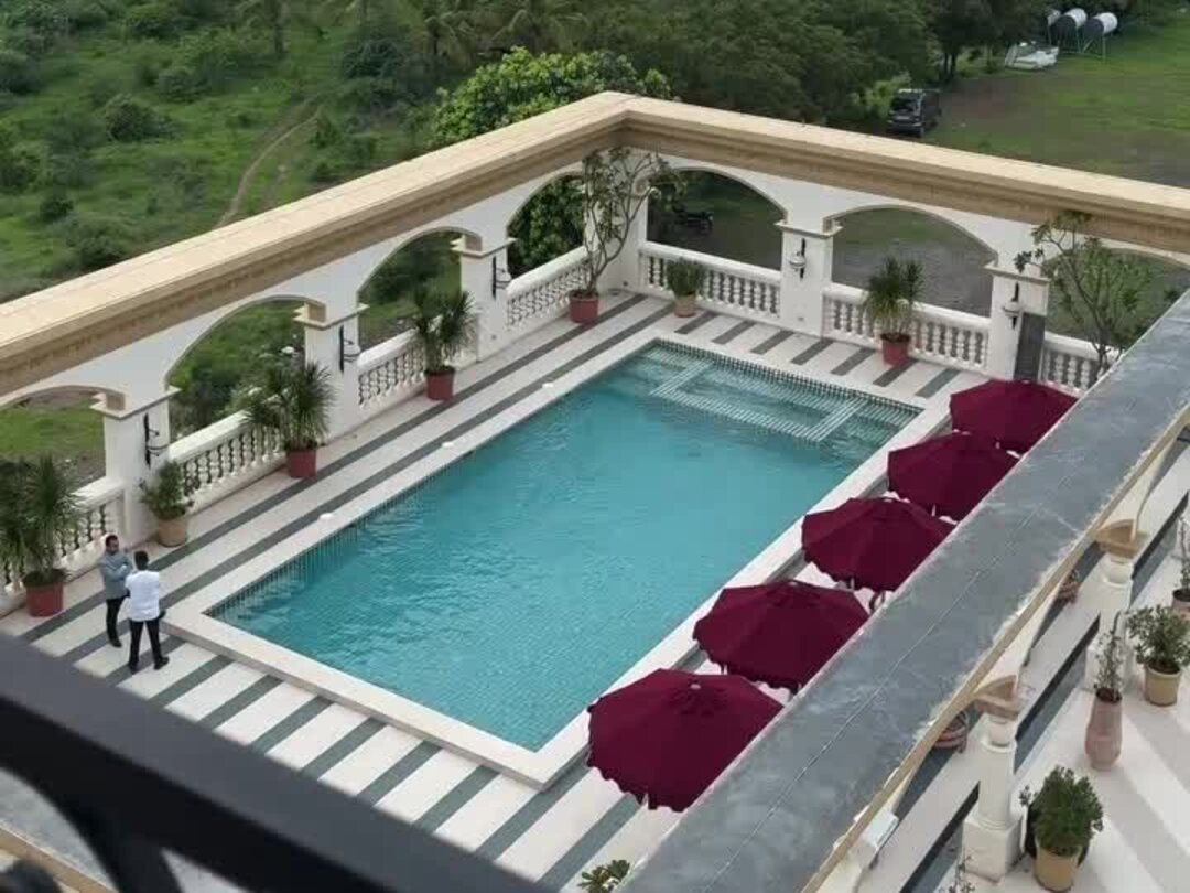 Pool terrace at Hotel Irada near Pune